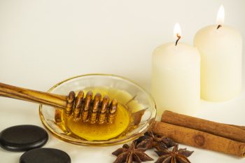 Honigmassage Stillleben Hotstones Kerzen